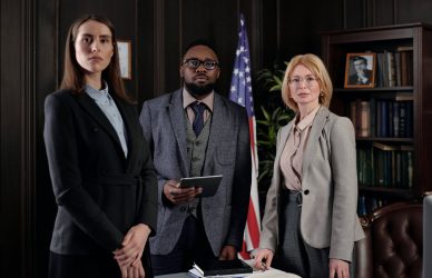 business people posing and looking at the camera