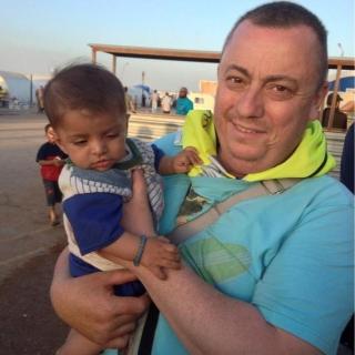 An undated family handout photo of British aid worker Alan Henning taken at a refugee camp on the Turkish Syria border