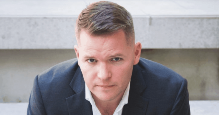 The Power-Lifting, In-House Lawyer Who Dismisses a Harvey Specter Comparison & Rises To CEO