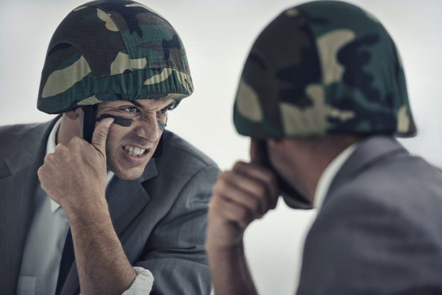 Businessman lawyer soldier in the trenches trench warfare 620x414