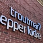 Troutman brick signage Cropped scaled