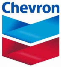 Two lawyers for Chevron Corp., the second-largest U.S. energy company, were indicted in Quito, Ecuador, over allegations stemming from a cleanup of oil pits that's now the subject of a multibillion dollar lawsuit.