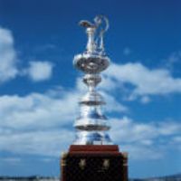 The Swiss holders of the America's Cup have launched legal action against an unidentified New Zealander in an attempt to regain a discarded piece of the prestigious yachting trophy.