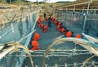 The U.S. Defense Department is looking for contractors to build a new facility at Guantanamo Bay, Cuba, where it can hold large-scale military trials for terrorism suspects held there.